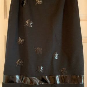 Black designer skirt with faux leather appliqué